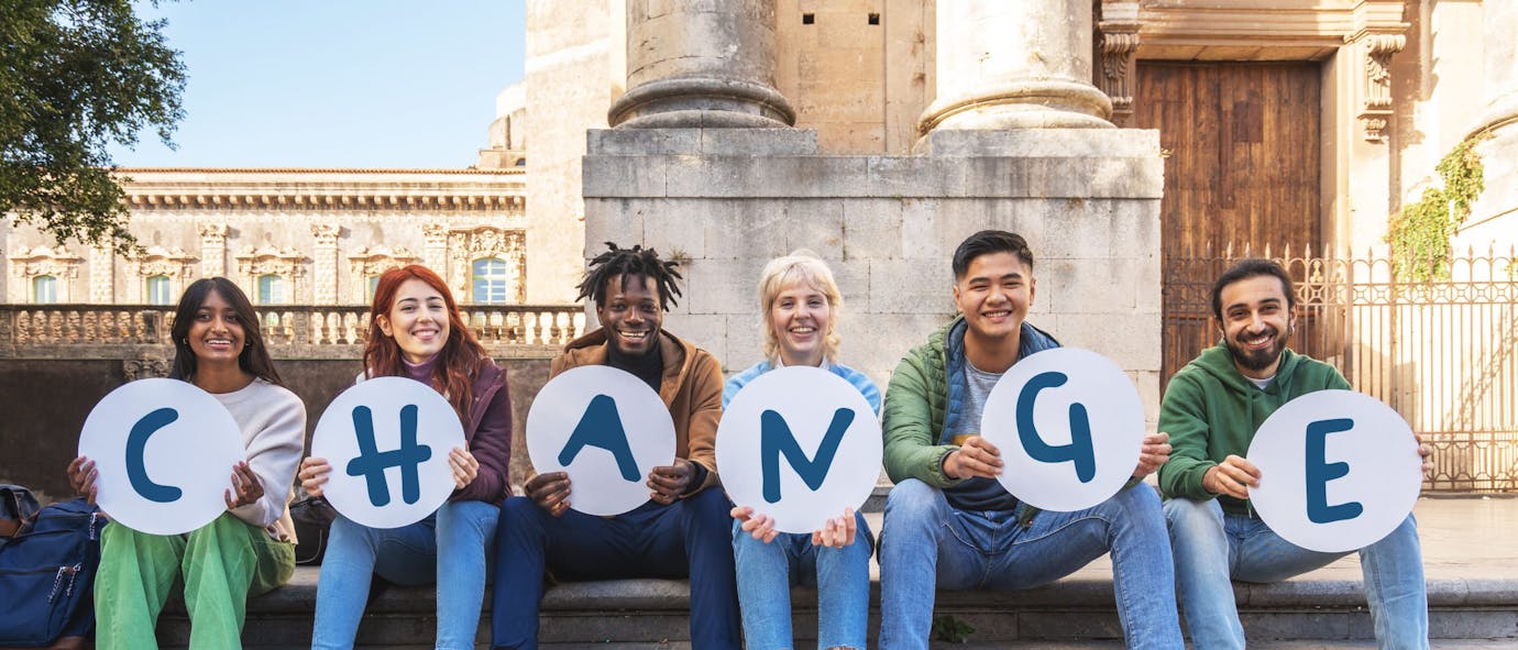 Group of students holding letter signs that spell out Connect.